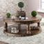 Table basse ronde en bois de style rustique avec finition gris antique, pieds tournés et tablette ouverte pour un rangement élégant