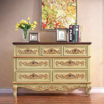 Commode décorative sculptée en bois massif à sept tiroirs