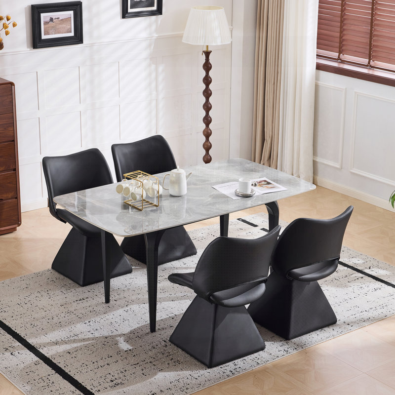 Chaise de salle à manger moderne pivotante en similicuir noir confortable et haut dossier pour des sièges élégants et polyvalents