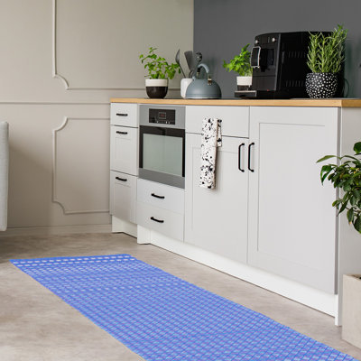 Tapis de couleur bleue losanges ligné