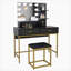 Ensemble de coiffeuse luxueux à trois couches avec miroir lumineux et beaucoup de rangement