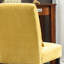 Élégante chaise d'appoint sans accoudoirs en tissu chenille avec coussin, pour des espaces contemporains et un confort accru-67646406