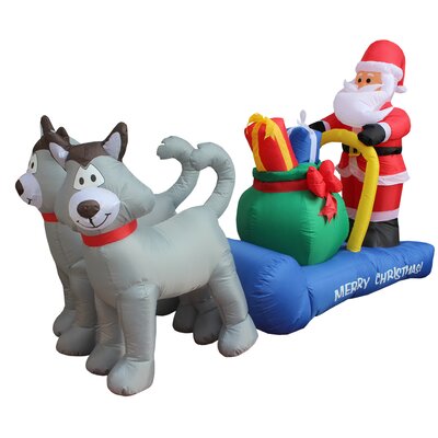 7 Foot Long Lighted Christmas Inflatable Santa Claus on Sleigh with Husky Dogs and Gift Bag Indoor / Outdoor Holiday Blow Up Yard Garden Decoration -  The Holiday AisleÂ®, F00E61FB673042D998372A98AF4BCE32