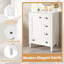 Meuble-lavabo compact en bois blanc avec lavabo en céramique, style moderne pour les salles de bain peu encombrantes
