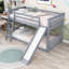 Lit superposé simple au-dessus d'un lit simple en bois avec glissière convertible et échelle-223639304