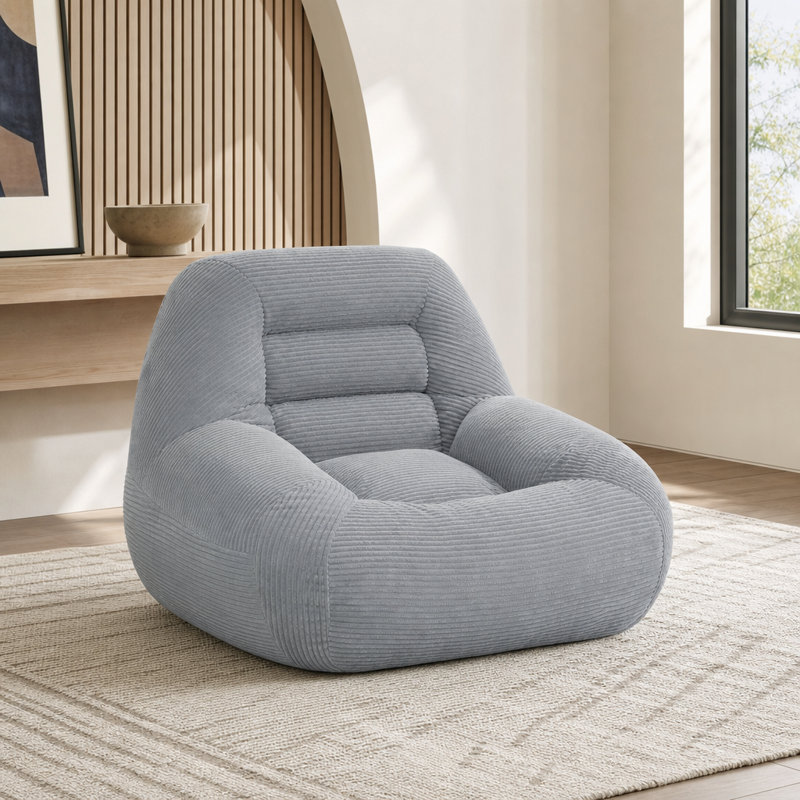 Pouf en velours côtelé gris, idéal pour une chambre d'étudiant, une chambre à coucher ou un salon.