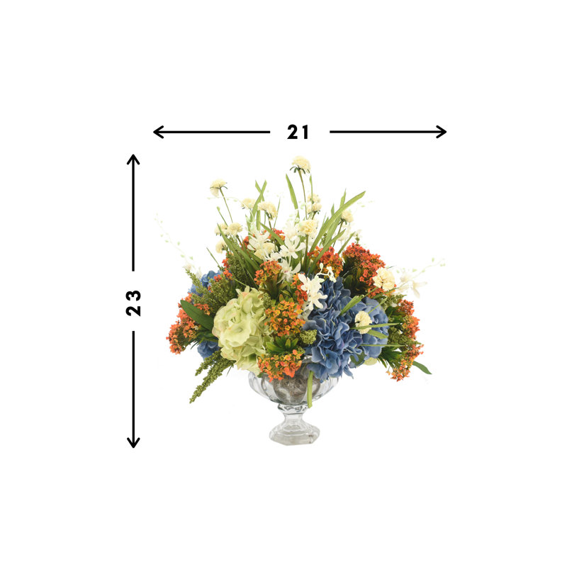 Arrangement floral mélangé dans un vase