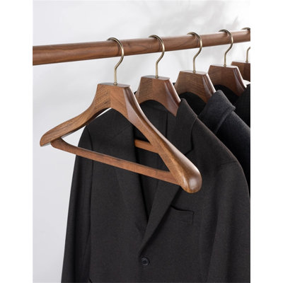 Solid wood women's clothes hanger