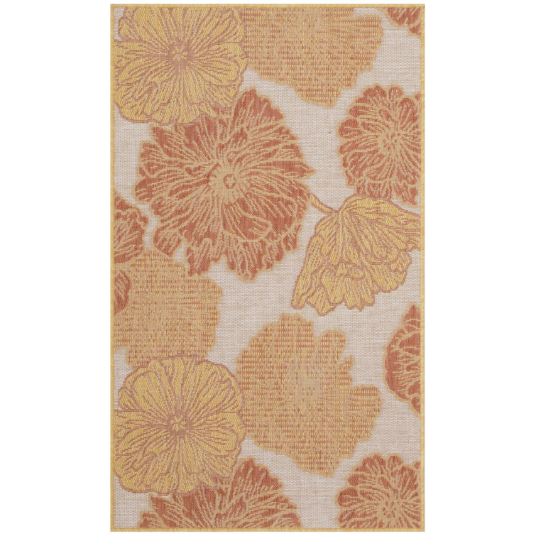 Pearletta Floral Polypropylene Indoor/Outdoor Area Rug in Orange/Coral
