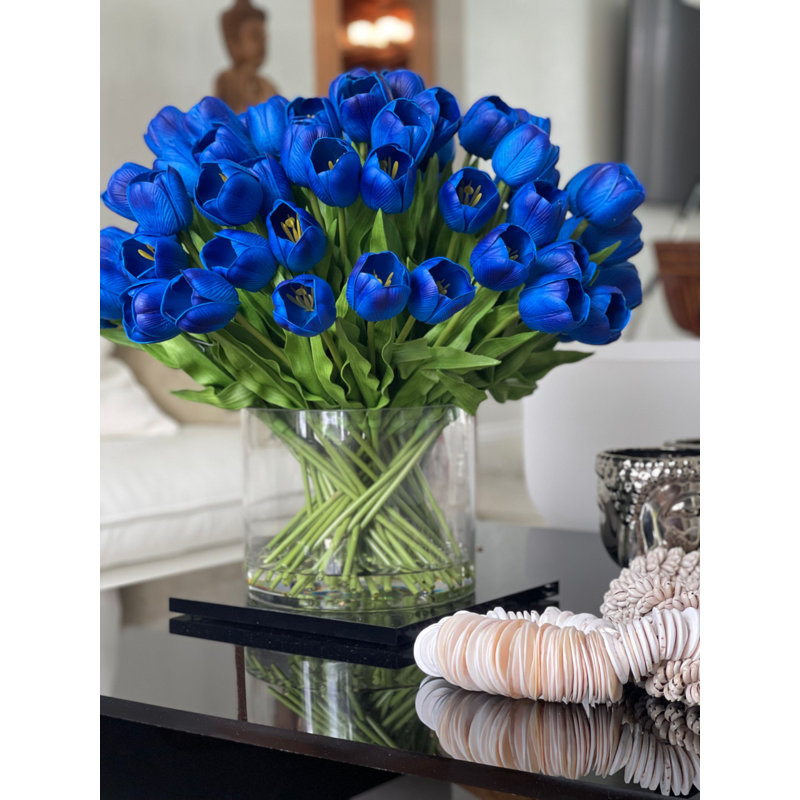 Grand cylindre Rota avec tulipes bleues 