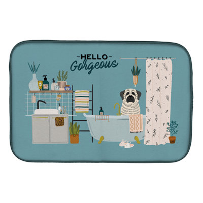 Tapis de séchage caniche dans la baignoire