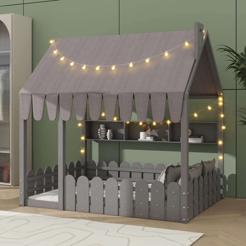 Lit de sol pour enfants de style Montessori équipé d'une barrière de sécurité, d'un auvent, d'un éclairage et de trois unités de rangement