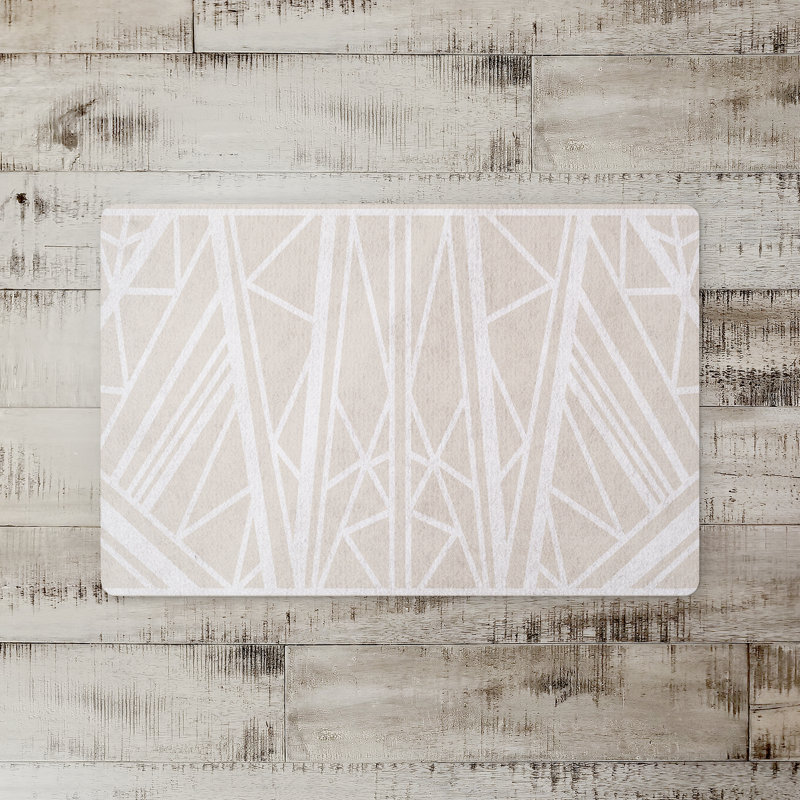 Tapis de bain fleurs monochromes