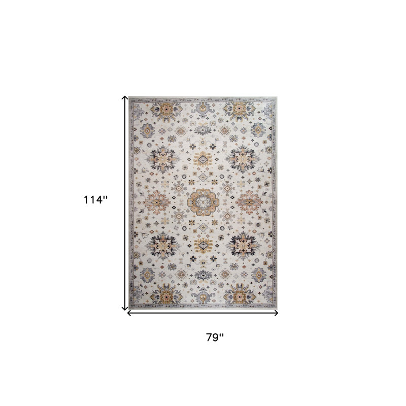 Tapis floral gris et doré 7 pi x 10 pi