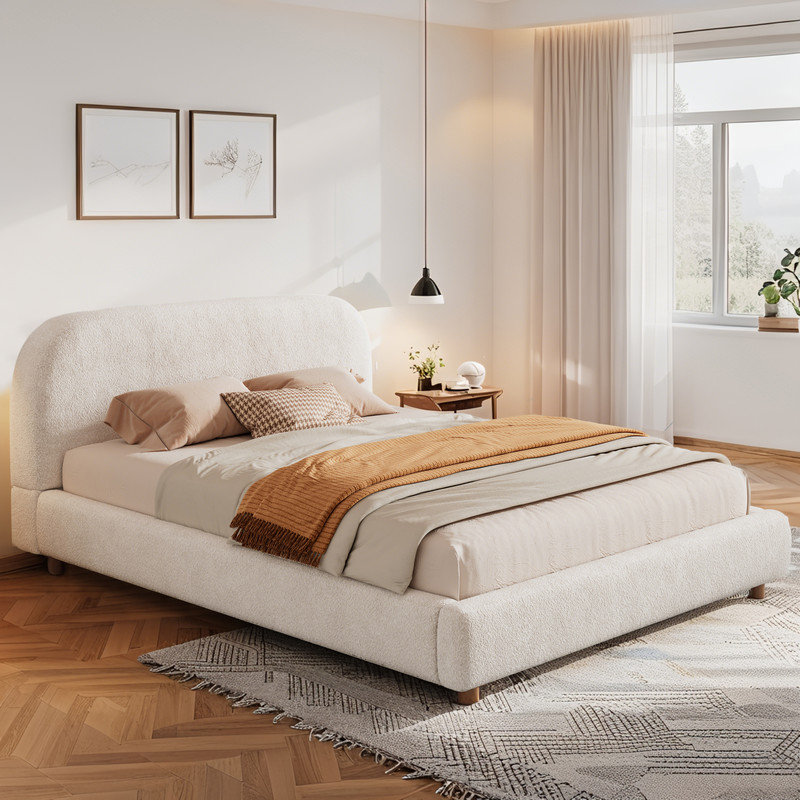 Lit plateforme tapissier en tissu avec tête de lit courbée Boucle, Grand lit