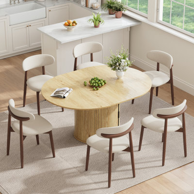 Table de salle à manger moderne extensible ronde avec rangement caché, table de salle à manger ovale 47,2 "à 63" avec chaises rembourrées