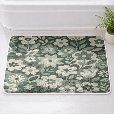 Tapis de bain à fleurs noires et blanches