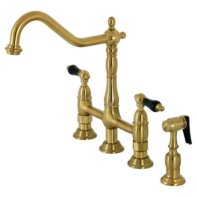 Kingston Brass Duchess Two-Handle 4-Hole Deck Mount Bridge Kitchen Faucet with Brass Side Sprayer