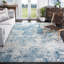 Tapis abstrait gris clair / bleu N'Keal-447731232-525112257