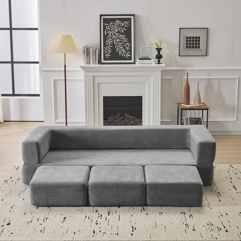 Canapé modulaire convertible 3 pieds avec repose-pieds Ebern Designs, Gris clair