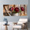 Ensemble de 3 tableaux sur toile tendue représentant des pivoines rouges dans un seau en métal avec fond en bois