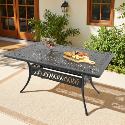 Shnorhali 58.27" L x 34.65" W Rectangular Cast Aluminum Patio Table with 1.88" Umbrella Hole