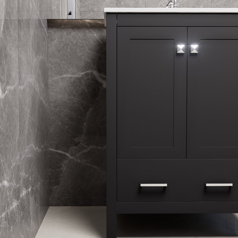 Meuble-lavabo noir de 24 po avec lavabo encastré intégré, armoire de rangement avec 2 portes et 1 tiroir, incluant des porte-couches doubles, une conception à fermeture en douceur et des solutions de rangement multifonctionnelles.
