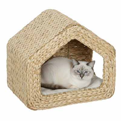 Une demeure pour chats conçue pour être fixée au mur.