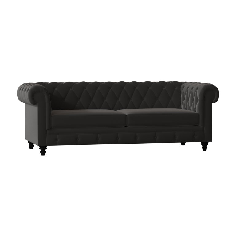 Canapé Chesterfield à accoudoirs roulés