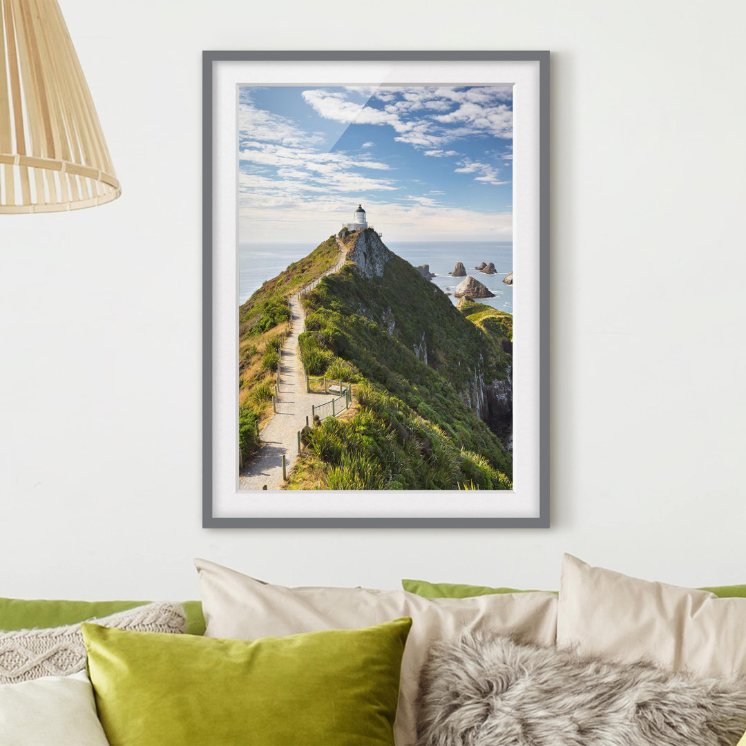 Gerahmtes Papierbild Nugget Point Leuchtturm und Meer Neuseeland