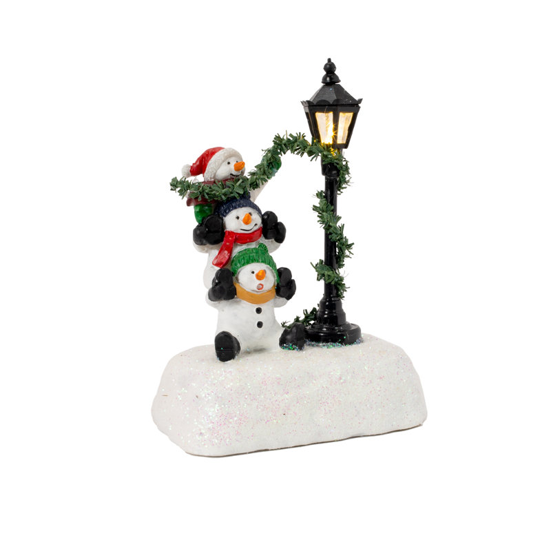 Accessoires de village de Noël - réverbère pile de bonhomme de neige