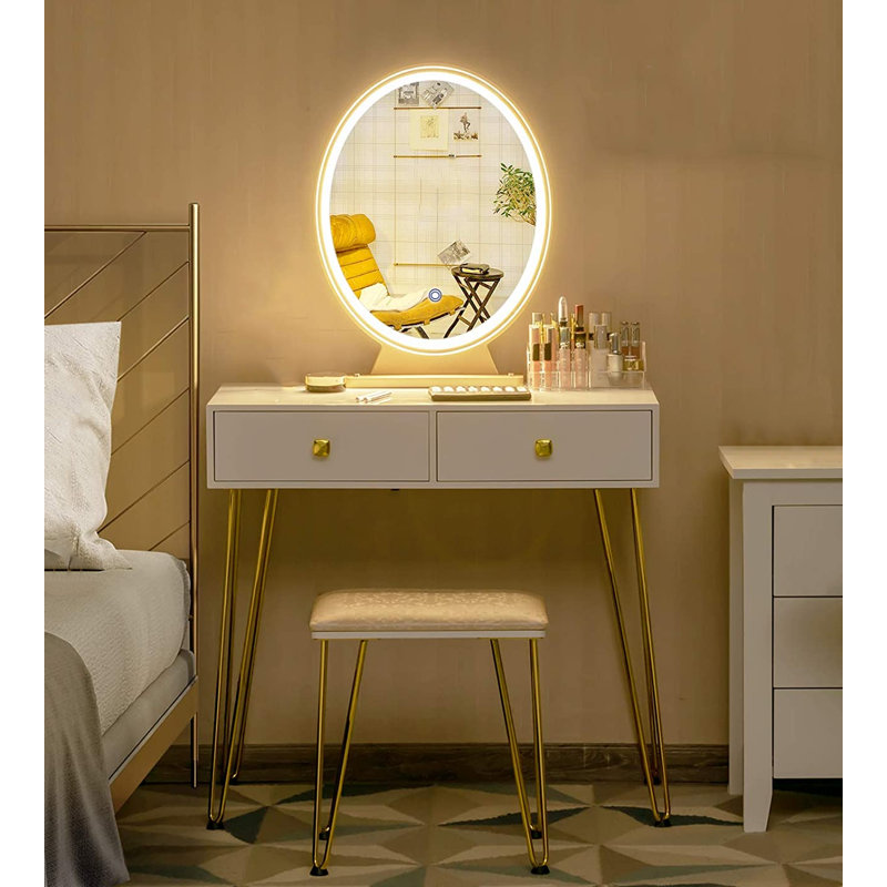 Table avec lampe miroir, coiffeuse avec tabouret rembourré et table pour chambre à coucher