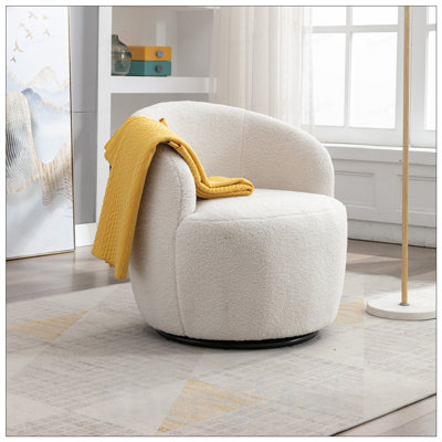 Fauteuil pivotant en tissu Teddy avec dossier ergonomique et anneau en métal thermolaqué pour une assise confortable
