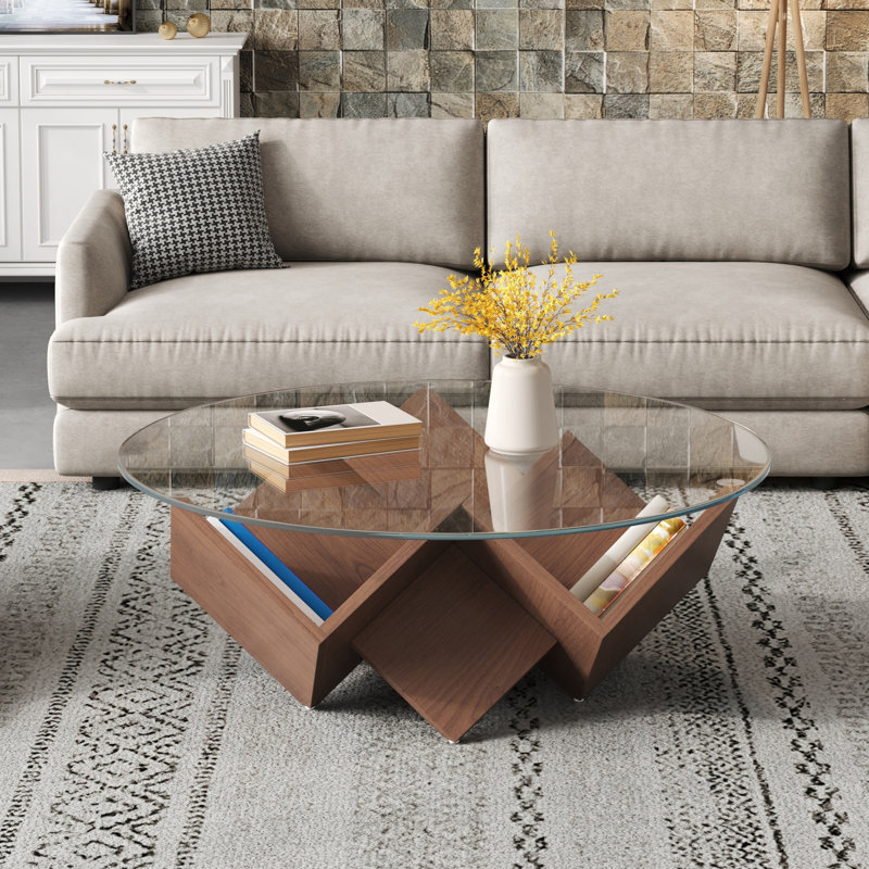 Table basse ronde avec plateau en verre et tablettes de rangement