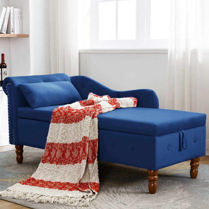Chaise longue de salon confortable avec velours et support dans un espace de rangement caché bleu marine