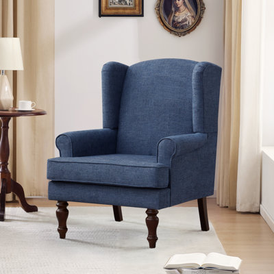 Fauteuil à oreilles rembourré Damiyah