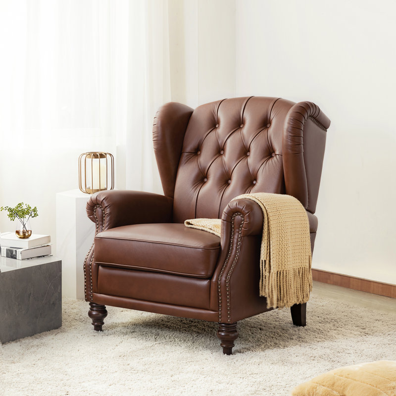 Fauteuil à oreilles en cuir véritable avec capitonnage à boutons Amyri, Cuir véritable brun