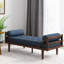 Chaise longue confortable en tissu bleu marine avec une base lisse au look contemporain et piqué gaufré