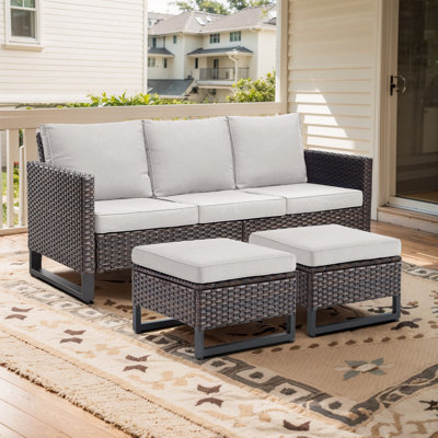 Nazime 74.02" Wide Outdoor Wicker Patio Sofa with Cushions and Ottomans