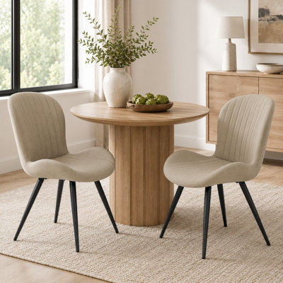 Chaise rembourrée en similicuir avec pieds en métal