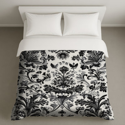 Housses de couette damassées noires et blanches