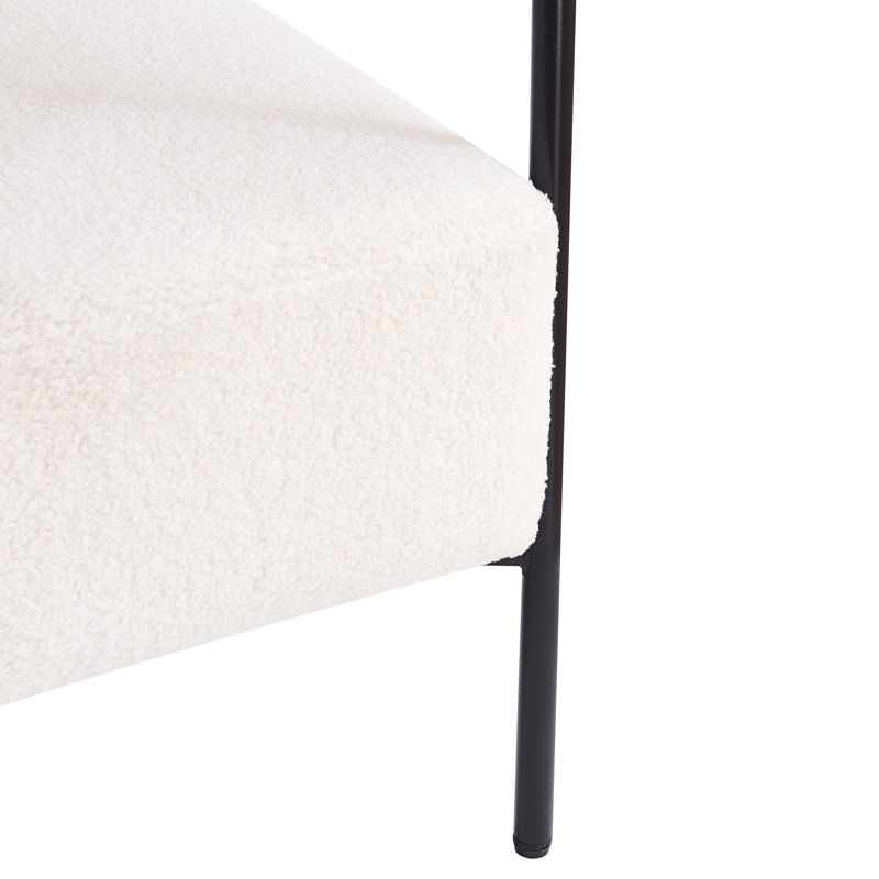 Fauteuil moderne blanc avec cadre bouclé et structure en métal noir stable - Élégante base en tissu