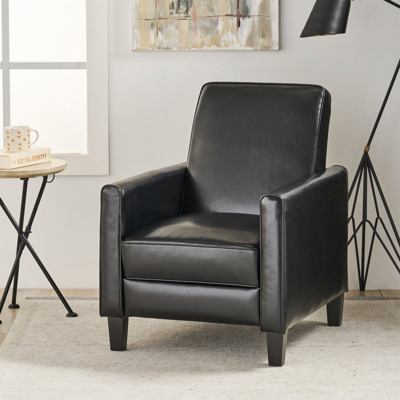 Chaise noire en similicuir pour une élégante décoration intérieure