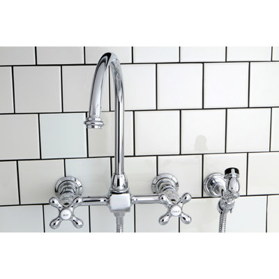 Kingston Brass Restoration Double-Handle 3-Hole Wall-Mount Bridge Kitchen Faucet with Brass Sprayer