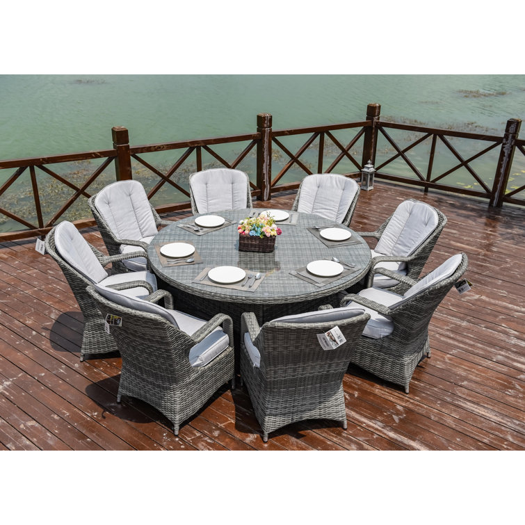 Round 9 - Piece 8 - Person 68.9" Long Dining Set with Cushions