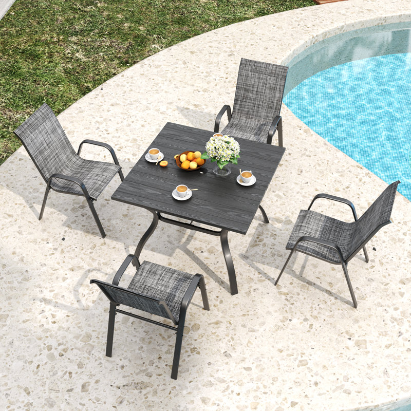 5-Piece Patio Dining Set With Ergonomic Stacking Chairs And Dining Table, Gray
