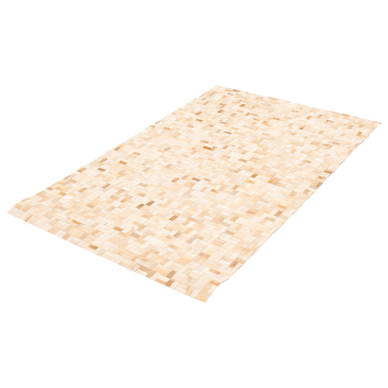Tapis ivoire en peau de vache Heggi