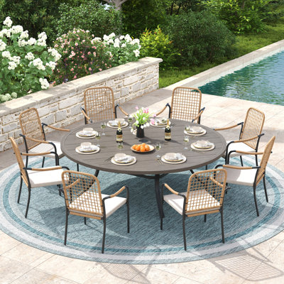 8-Person Patio Dining Set with 60" Round Dining Table and 8 Cushioned Rattan Stackable Chairs