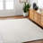 Jarrell Solid Color Flatweave Recycled P.E.T. Indoor / Outdoor Area Rug in Cream-1021278773
