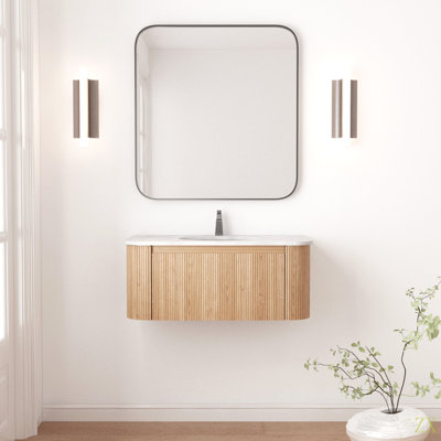Meuble-lavabo mural 36 po Arcora avec comptoir en marbre artificiel, lavabo en céramique, conception courbée avec rayures, pré-assemblé